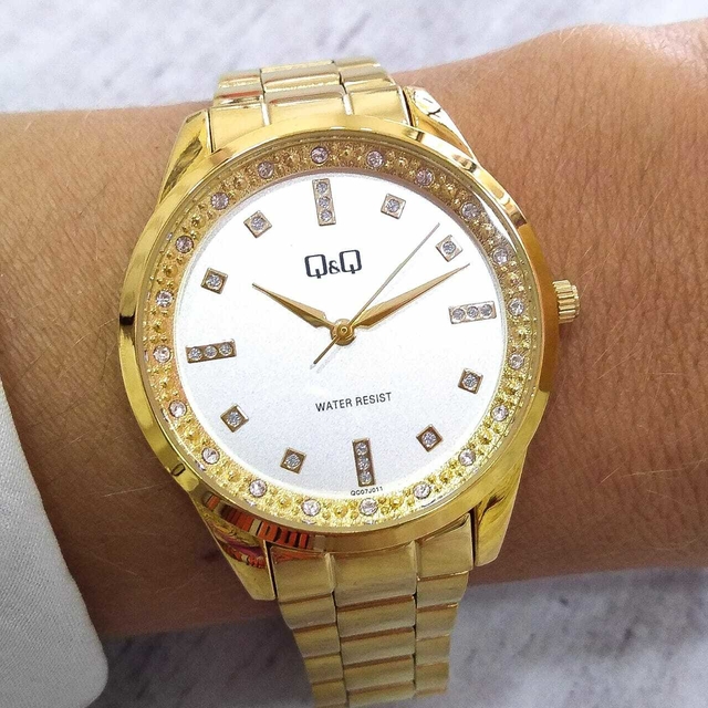 Reloj Swatch dorado de dama | lerevemexico