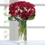 Lindo arranjo com 24 rosas vermelhas selecionadas a mão , folhagem de drascena, egipsofila no vaso de vidro, arranjo luxuoso e sofisticado para presentearmos quem amamos.