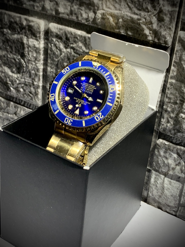 Rolex azul best sale con dorado