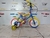 BICICLETA R12 BMX TRICOLOR PLASTICO/ROJO/AZUL en internet