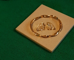 Bracelete Articulado Torcido Banho Ouro 18k na internet