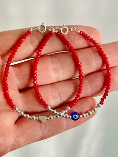 Pulsera con Dije ojito y bolitas plata 925 y cristal