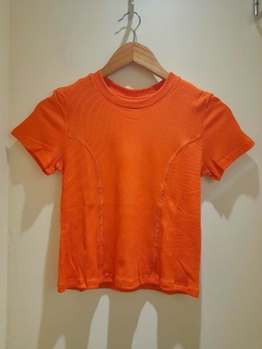 REMERA LENTE NARANJA en internet