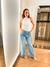 Calça jeans full length com aplicações lança perfume - comprar online