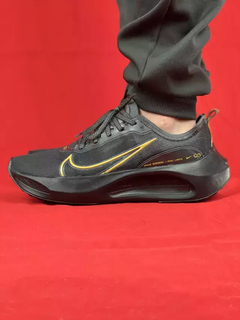 Nike Zoom Preto/Dourado Fly X