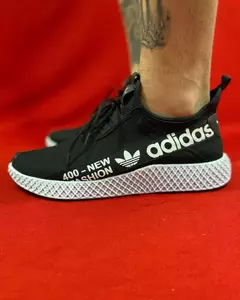 Adidas preto sola branca