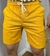 SHORT LINHO TS / MOSTARDA