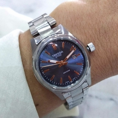 Reloj Tressa Date TR-125 Para Dama Malla Y Caja De Acero Sumergible Con Cuadrante Azul