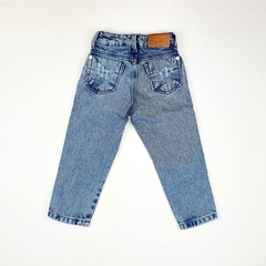 Calça jeans infantil destroyed botões na internet