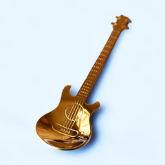 Colher de guitarra dourada
