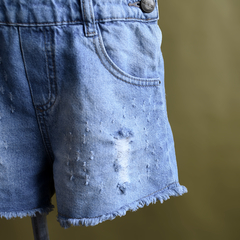 Macacão jeans destroyed - comprar online