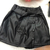 SHORT SAIA COURO FAKE PRETO