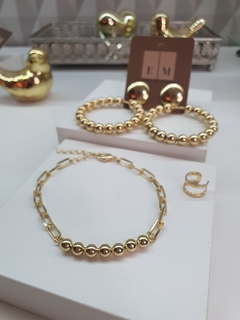 Pulseira no elo cartier, com bolinhas, banhada em ouro 18k. - comprar online