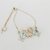 Pulseira Com 2 Bonequinhos Cristal - comprar online