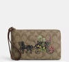 Large Corner Zip Wristlet In Signature Canvas With Floral Horse And Carriage 20x12cm Muñequera Coach