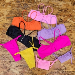 CONJUNTO TOP CON ESCOTE AL CENTRO Y LESS BIKINIS AGHATTA ART: 300 COLORES TALLES SURTIDOS 85 - 90 - 95 - 100 (X DOCENA)