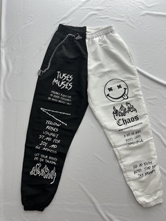 Calça com corrente duas cores preta e branca moda gringa - comprar online