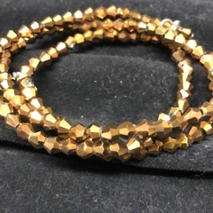 PULSERA ESTIRABLE DE CRISTAL CHECO DE 4 MM DORADO METALIZADO