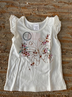 Remera manga corta MARIPOSA CON FLORES