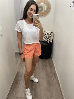 Short duplo de corrida básico laranja light Obbia