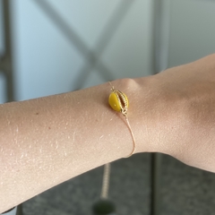 PULSEIRA BÚZIO AMARELA BANHADA A OURO