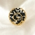Anel Artesanal Redondo preto e branco com espiral banhado a ouro 18