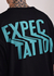 Remera Over Expectation