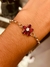 Pulsera de plata flor roja con circonias