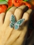 Anillo de mariposa circonio verde