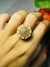 Anillo espiral redondo con circonia rose y blanco enchapado en oro