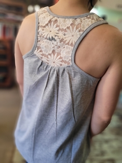 Musculosa flores AMMA en internet