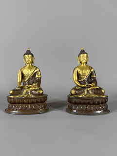 Budas en bronce empavonado y dorado