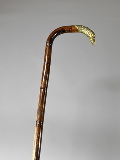 Bastón en caña de bamboo con empuñadura cabeza de águila en bronce en internet