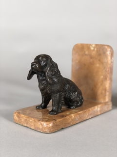 Sostiene libros escultura de perros en bronce y mármol en internet