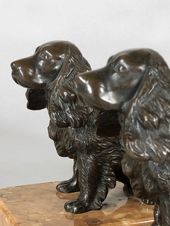 Sostiene libros escultura de perros en bronce y mármol
