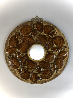 Espejo circular en madera tallada con hojas