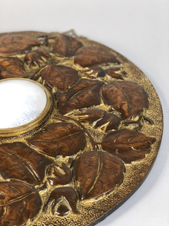 Espejo circular en madera tallada con hojas en internet