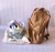 Combo mochila Matilda con manta en corderito y cesto con ajuar de productos
