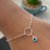 PULSEIRA CIRCULO PINGENTE OLHO GREGO - comprar online