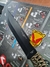 Machete Explorer de acero plegado color negro con hoja enteriza, mango táctico, y además incluye funda de cordura. - comprar online