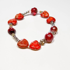 103- Brazalete Corazones - Maura Igartua