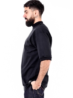 Remera oversize negra de algodon peinado 20.1 con cuello y puño de morley en internet