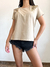 Imagen de Remera Plumas Gold