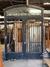Portón de hierro doble hoja con banderola- Cod 5049 en internet