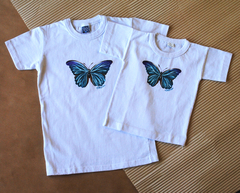 Remera mariposa, niño, manga corta.