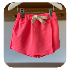 Short saia rosa neon