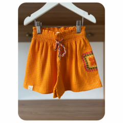 Short laranja flor