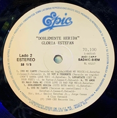 Vinilo Gloria Estefan Doblemente Herida 1989 Argentina - BAYIYO RECORDS