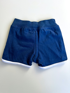 Short bebe H&M Talle 1-2 meses azul al costado blanco en internet