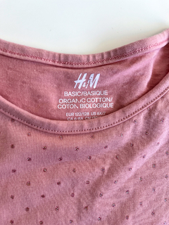 Remera niña manga larga rosa con billitos H&M talle 7-8 años en internet